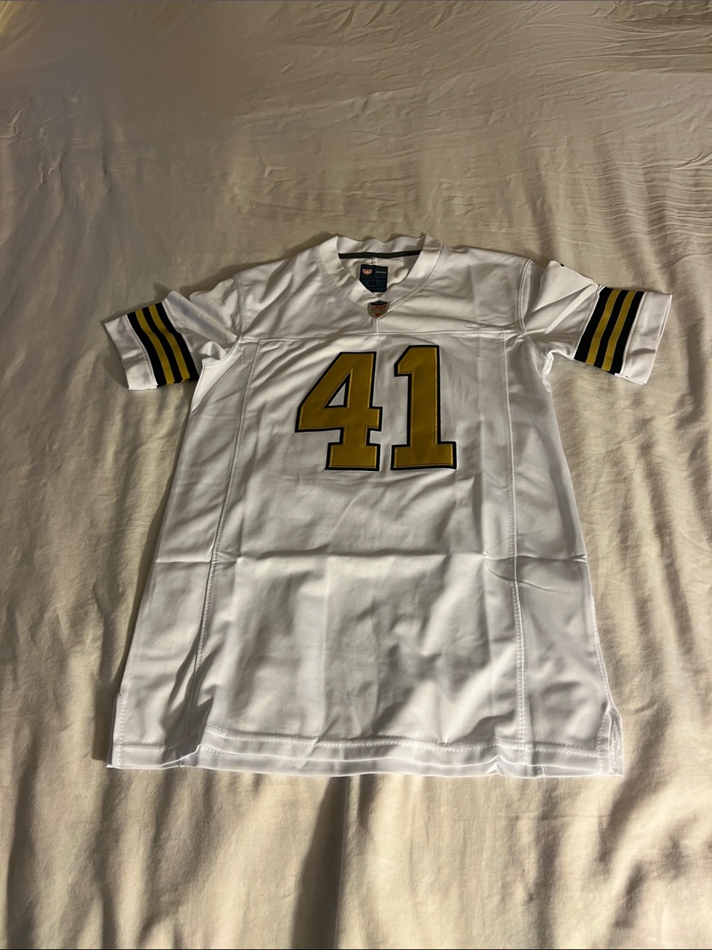 White Football Jersey with Gold "41" and Black-Trim Sleeves never worn. Y-XL
